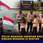 Polisi Bagikan Sarapan dan Kibarkan Ribuan Bendera di Bintan