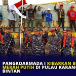 Pangkoarmada I Kibarkan Bendera Merah Putih di Pulau Karang Singa Bintan