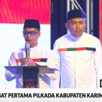 Debat Perdana, Paslon 01 Iskandarsyah-Rocky Bawole Paparkan Visi-Misi