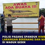 Polisi Pasang Spanduk Himbauan Larangan Berenang dan Mancing di Waduk Gesek