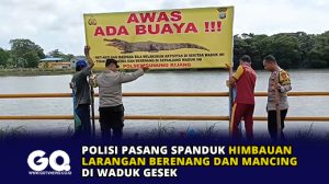 Polisi Pasang Spanduk Himbauan Larangan Berenang dan Mancing di Waduk Gesek