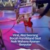 Viral, Aksi Seorang Bocah Handstand Saat Naik Wahana Ayunan Berputar