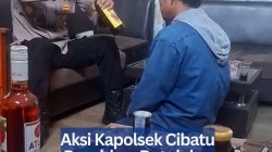 Aksi Kapolsek Cibatu Pecahkan Botol Miras dan Nasehati Pedagang Viral