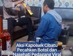 Aksi Kapolsek Cibatu Pecahkan Botol Miras dan Nasehati Pedagang Viral