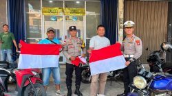 Semarak Kemerdekaan, Satlantas Polres Bintan Bersama Warga Bagikan 200 Bendera Merah Putih